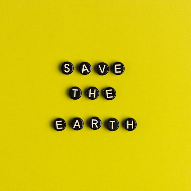 Free photo save the earth, quote with beads