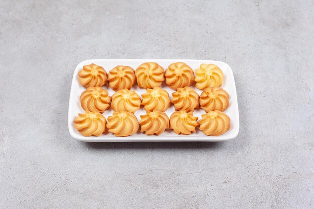 Savory platter of cookies on marble background. High quality photo