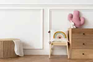 Free photo scandinavian kids play room with wooden furniture