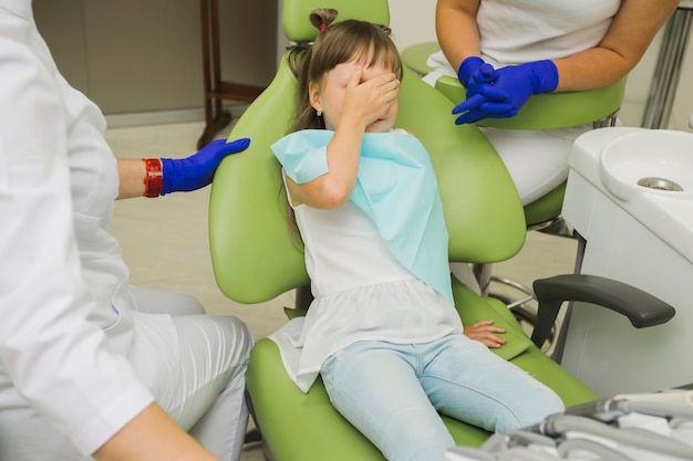 Scared girl at the dentist