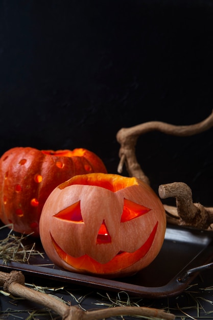 Free photo scary halloween carved pumpkin lantern with spooky face