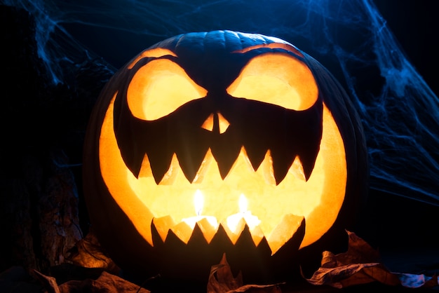 Free photo scary halloween pumpkin with light