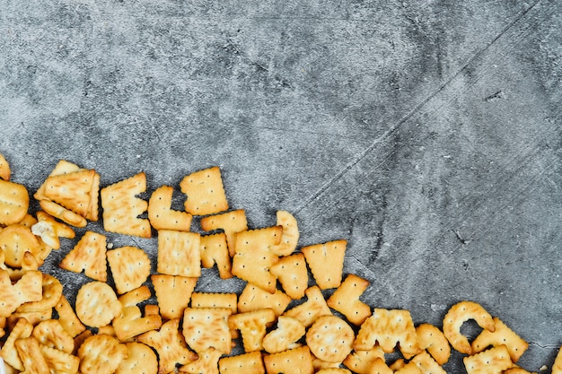 Scattered alphabet crackers.