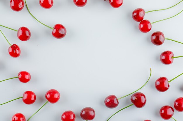 Scattered cherries. flat lay.