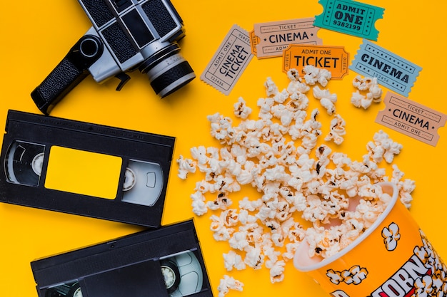 Scattered popcorn box with videotape