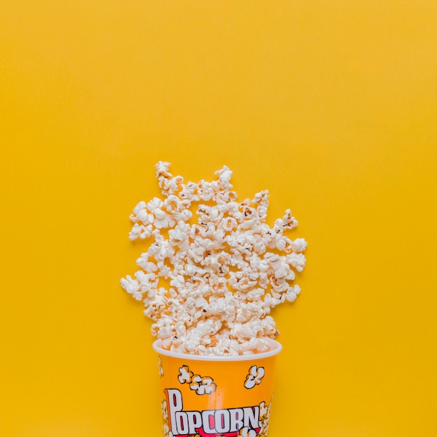 Free photo scattered popcorn box