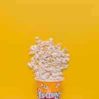 Free photo scattered popcorn box