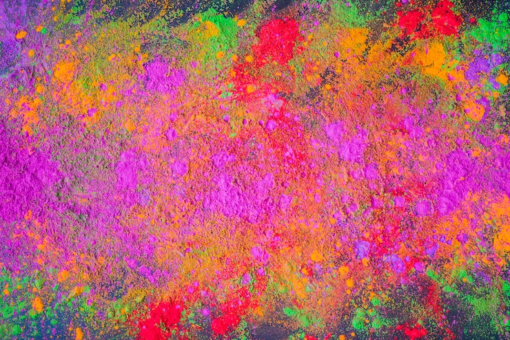 Free Photo scattered purple powder on dark table