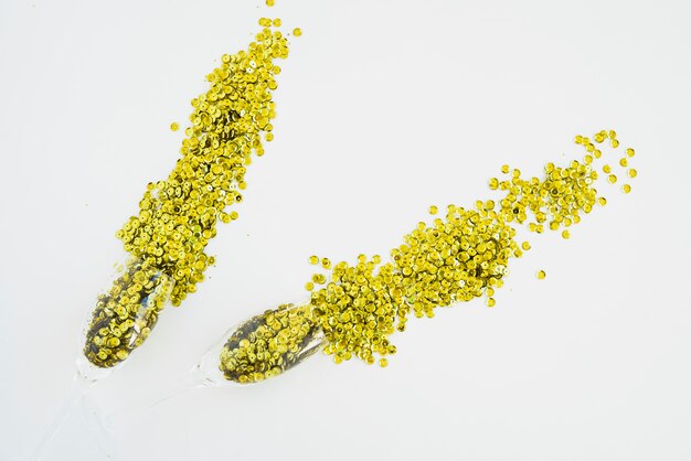 Scattered spangles on white table