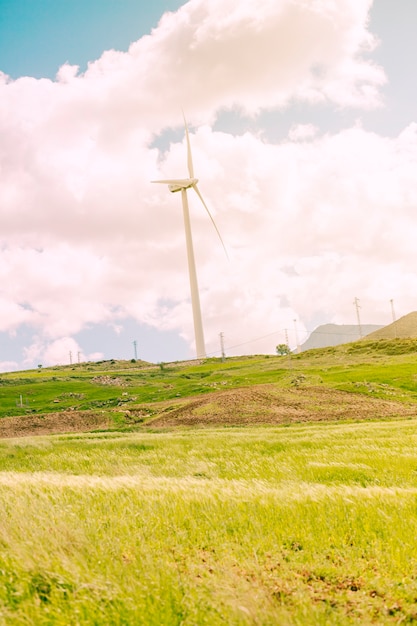 Free photo scenic countryside with windmills