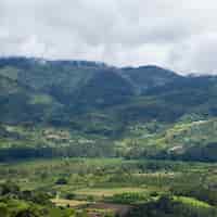 Free photo scenic view of hill and mountain in costa rica