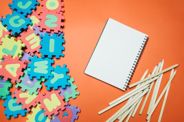 School composition with stationery and toys