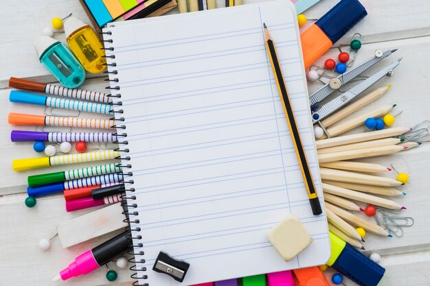 School Decoration With Notebook On Wooden Surface Photo Free