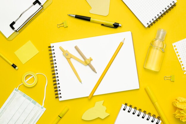 School items on yellow background
