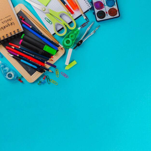 School kit on blue background