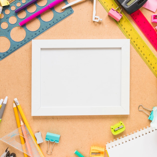 Free photo school supplies around frame