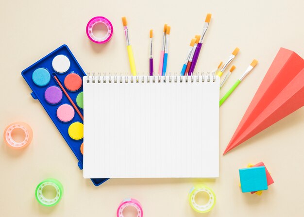 School supplies on beige background