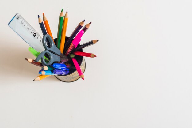 School supplies in cup