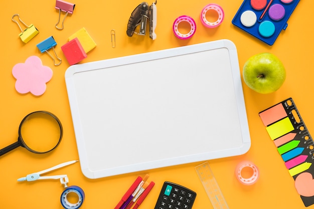 School supplies with whiteboard in center