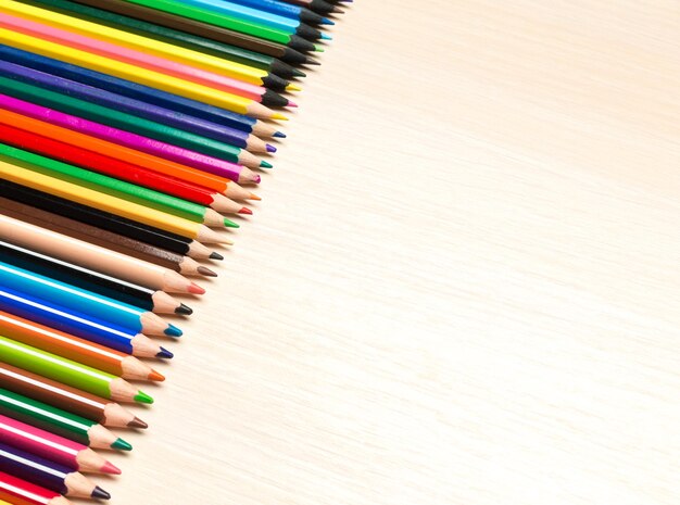 School supplies on wooden background