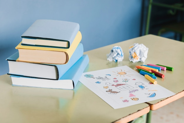 School workplace with books and drawing