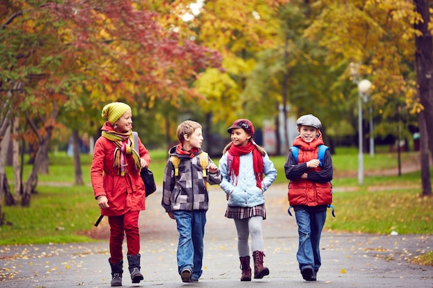 Free photo schoolchildren joking and laughing