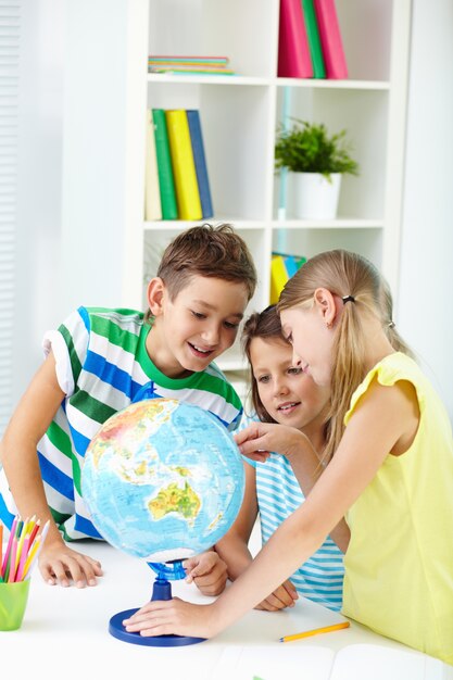 Schoolchildren learning geography