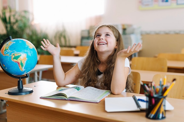 Free photo schoolgirl on geography lesson