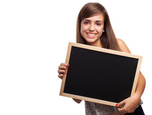 Schoolgirl having fun with an empty slate