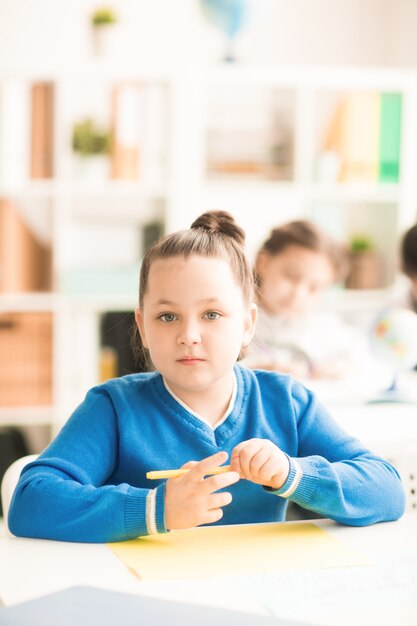 Schoolgirl at lesson