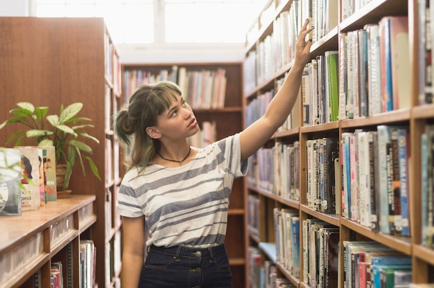 Schoolgirl in library