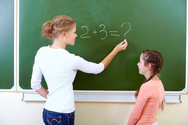 Schoolgirl in math class