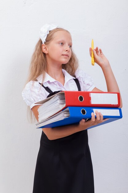 Schoolgirl with folders