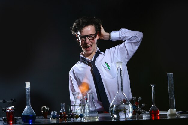 Scientific doing chemical experiment