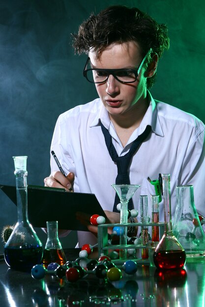 Scientific doing chemical experiment