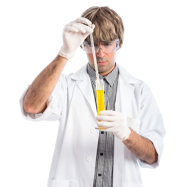 Free photo scientist analyzing a test-tube