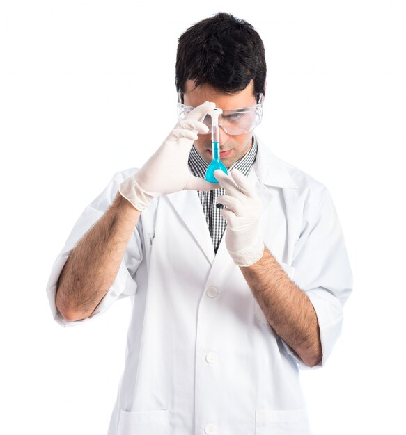 Scientist analyzing a test-tube