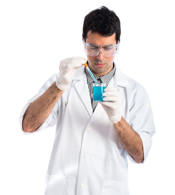 Scientist analyzing a test-tube