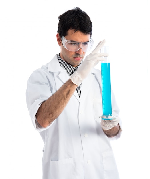 Scientist analyzing a test-tube