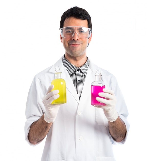 Scientist holding test-tubes