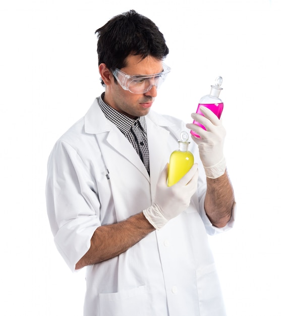 Scientist holding test-tubes