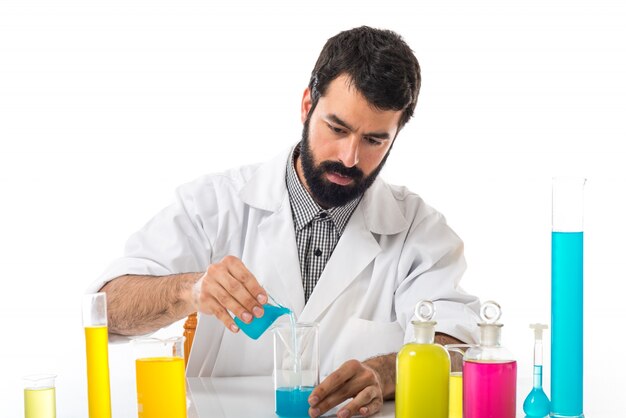 Scientist man with test tubes