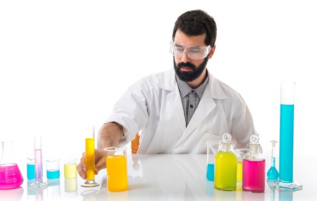 Scientist man with test tubes