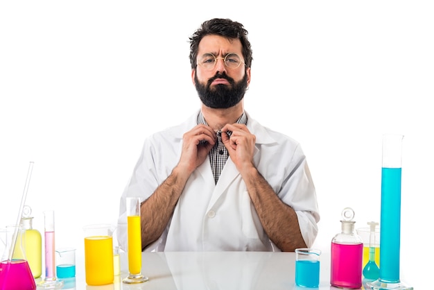 Free photo scientist man with test tubes