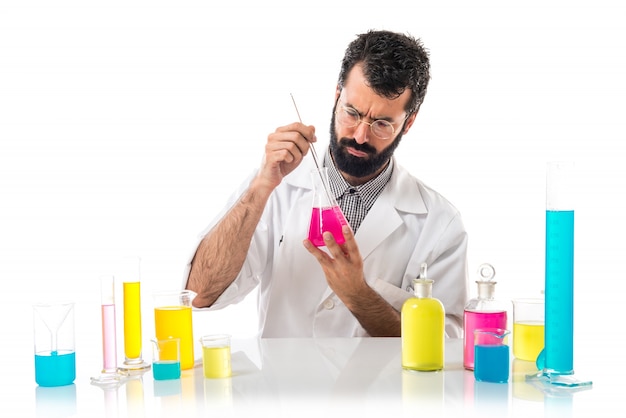 Scientist man with test tubes