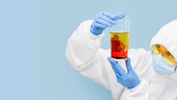 Free Photo scientist mixing different substances with copy space