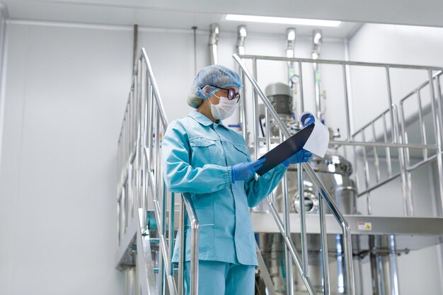 Scientist monitors the readings on the equipment