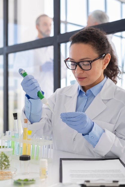 Scientist working with pipette