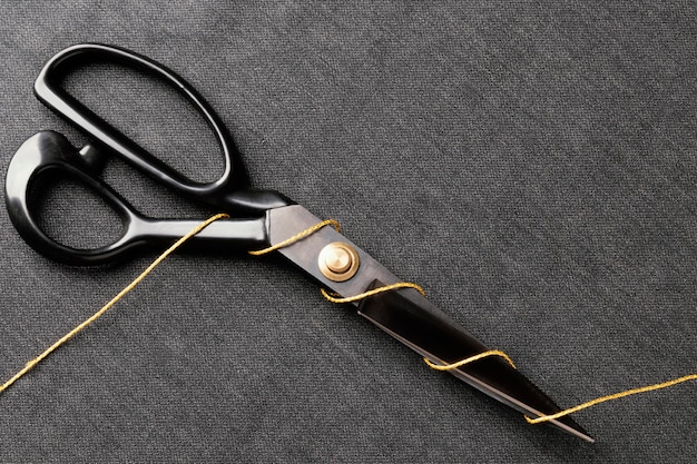 Scissors with thread top view