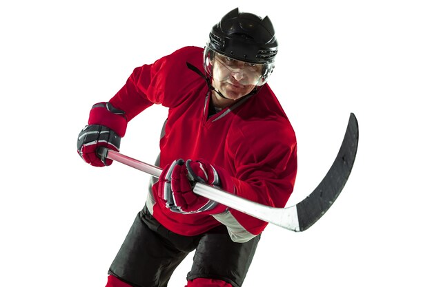 득점. 얼음 코트와 흰 벽에 막대기로 남자 하키 선수. 장비와 헬멧 연습을 착용하는 스포츠맨. 스포츠, 건강한 라이프 스타일, 운동, 운동, 행동의 개념.